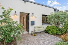 Hauptbild Exklusiv sanierter Reihenendbungalow mit hochwertiger Ausstattung, Sauna und neu gestaltetem Garten!